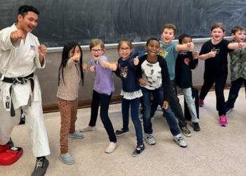 Rickyjon Balgenorth teaching karate to elementary school students with the Purdue Karate Club